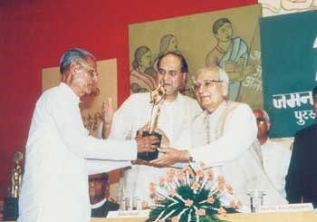 Mr.Bhaskar Hiraji Save Recieving Award from President